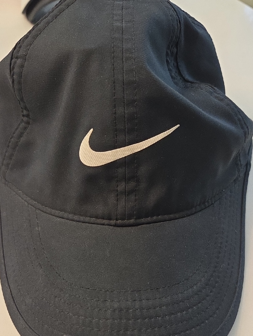 Nike Black Hat with White Swoosh Emblem